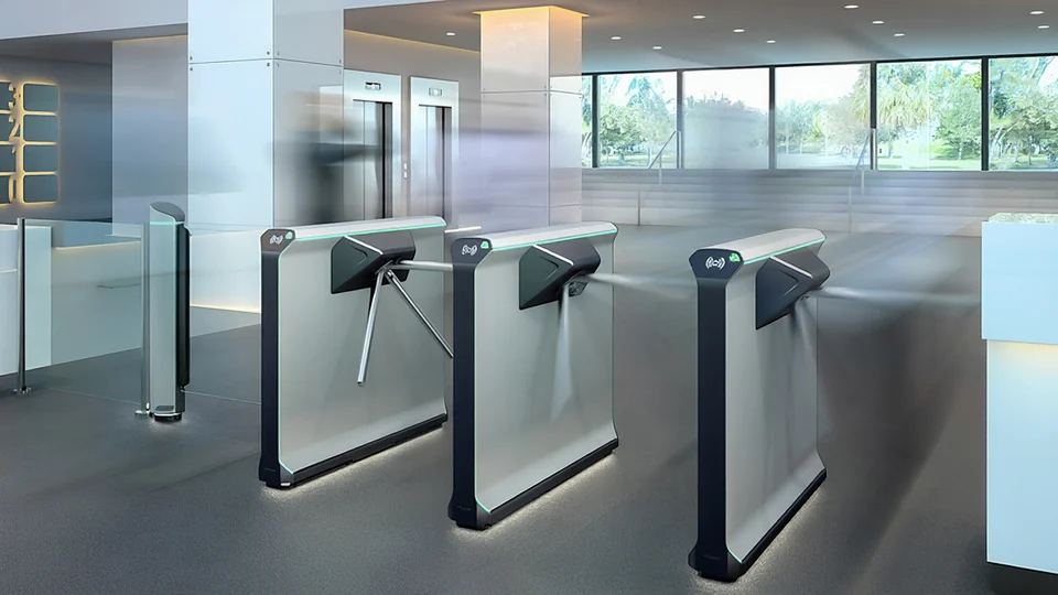 Three Magnetic mTripod turnstiles in a bright office lobby